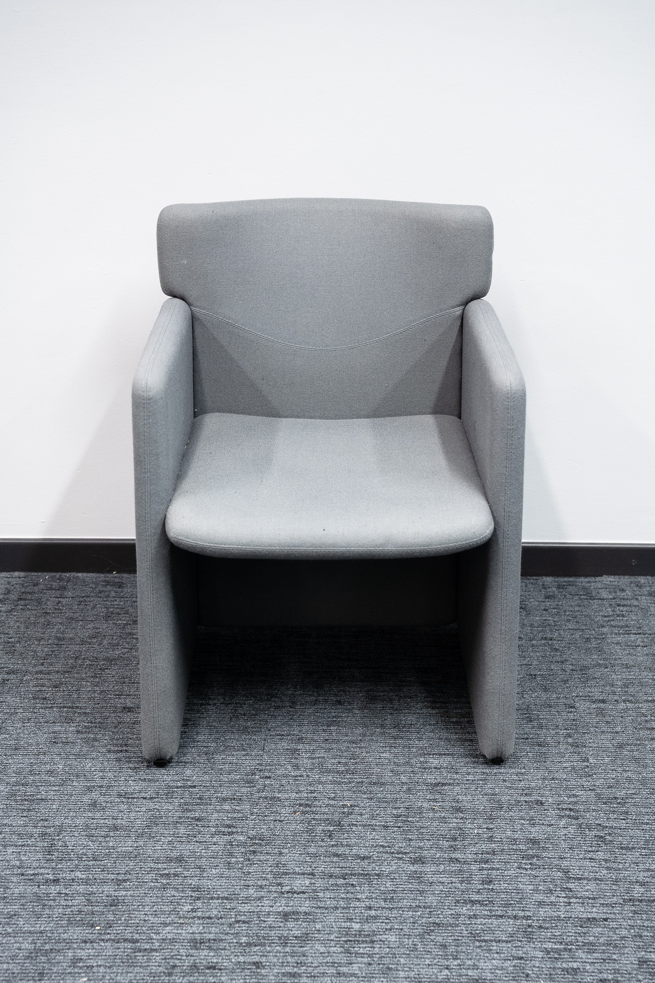 1-seater grey fabric armchair