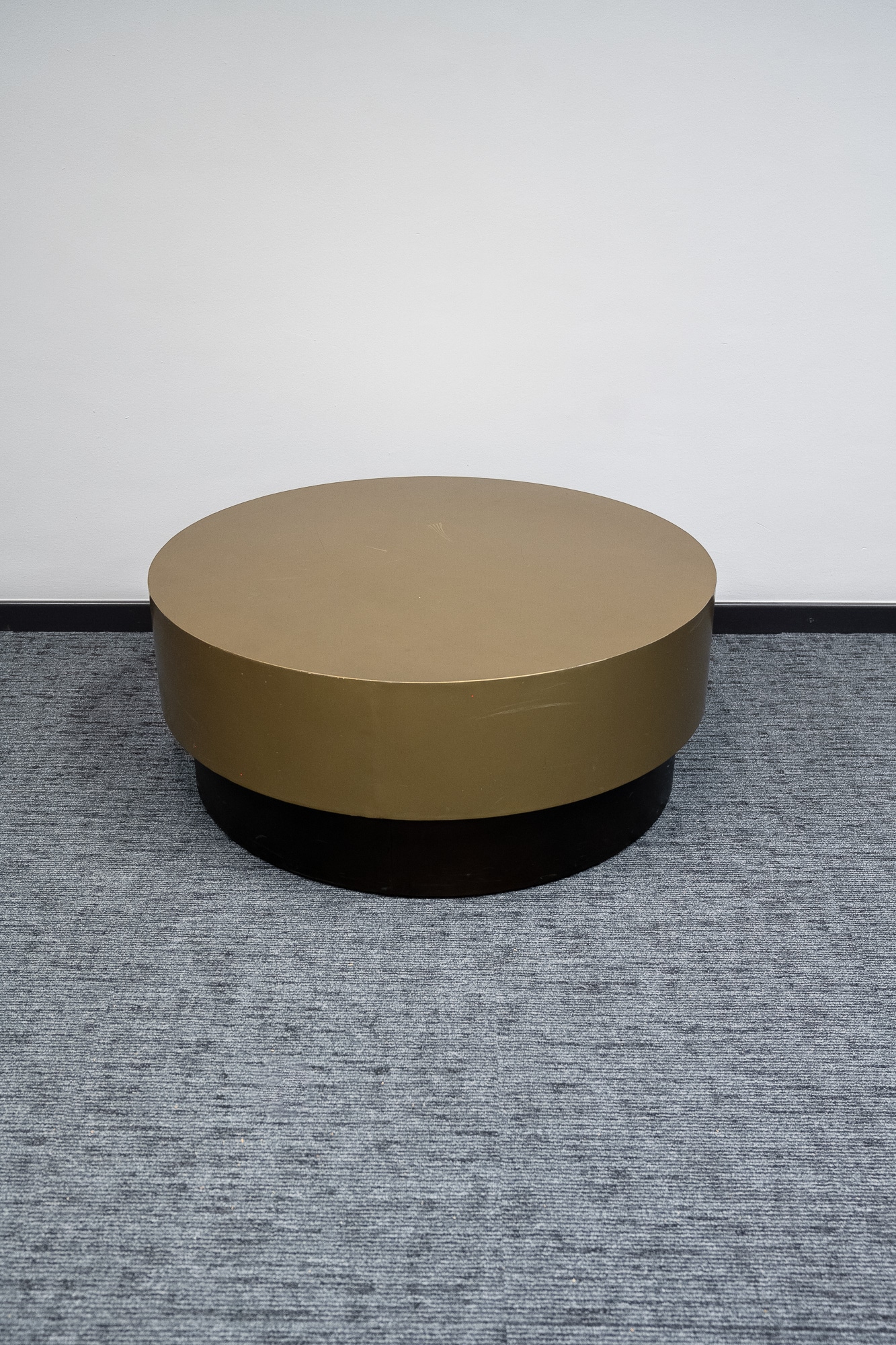 Gold and black round metal coffee table