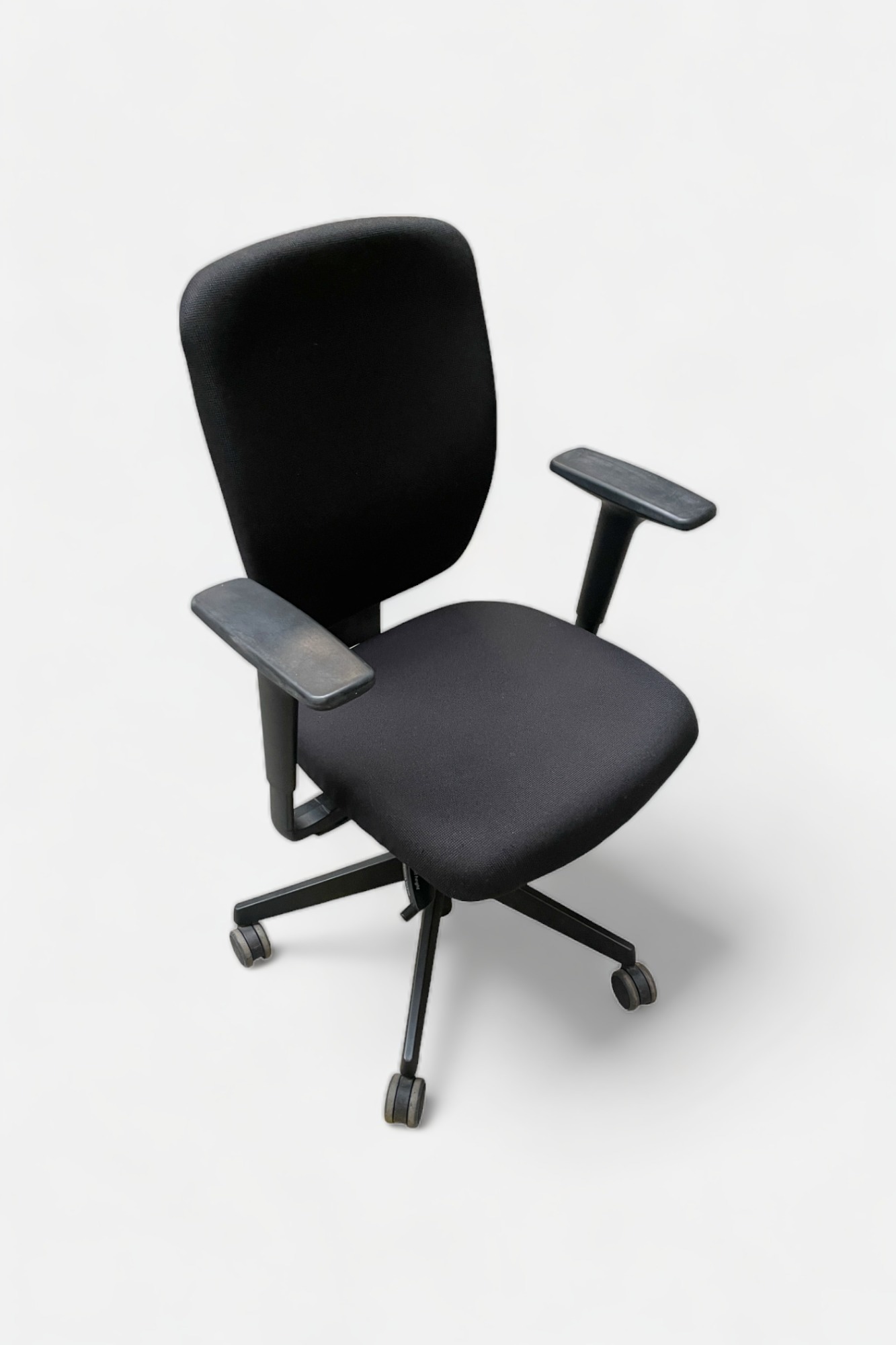 Adjustable black office chair on wheels