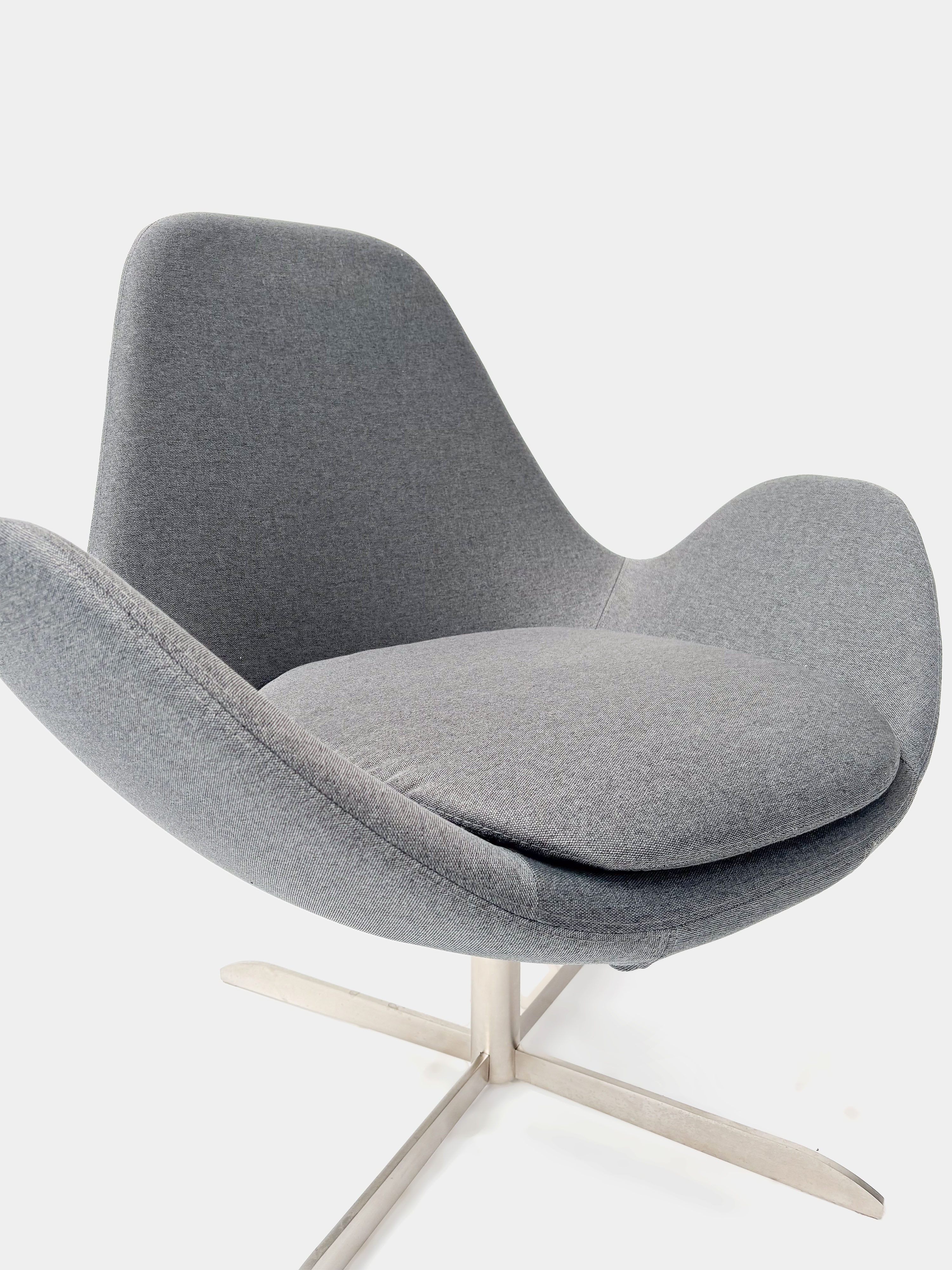 GHOST Low Grey Armchair on metal swivel legs