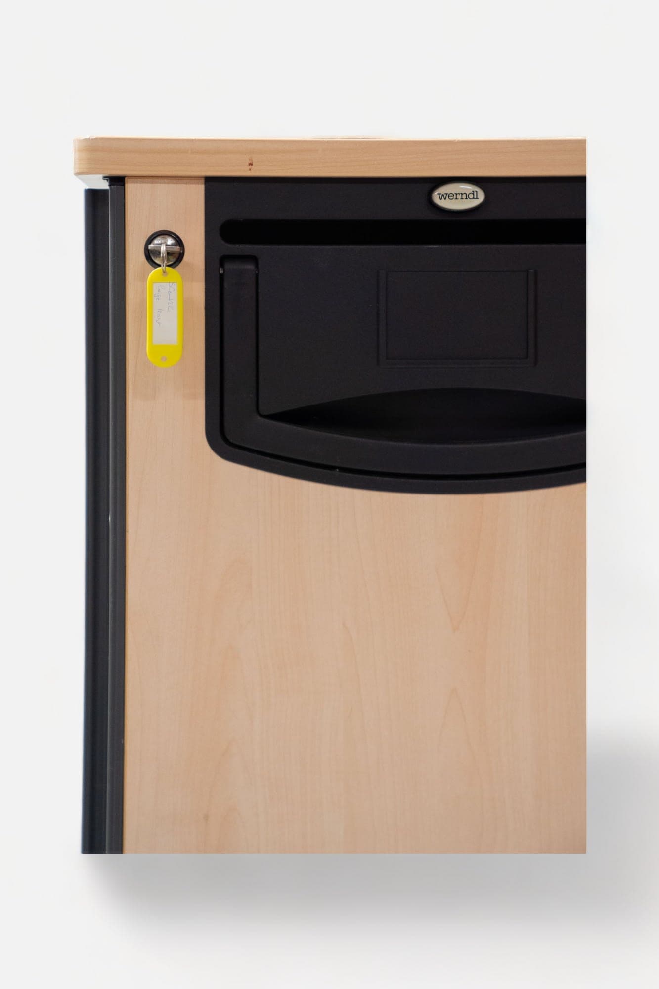 Grey and wooden storage on wheels with key locking system