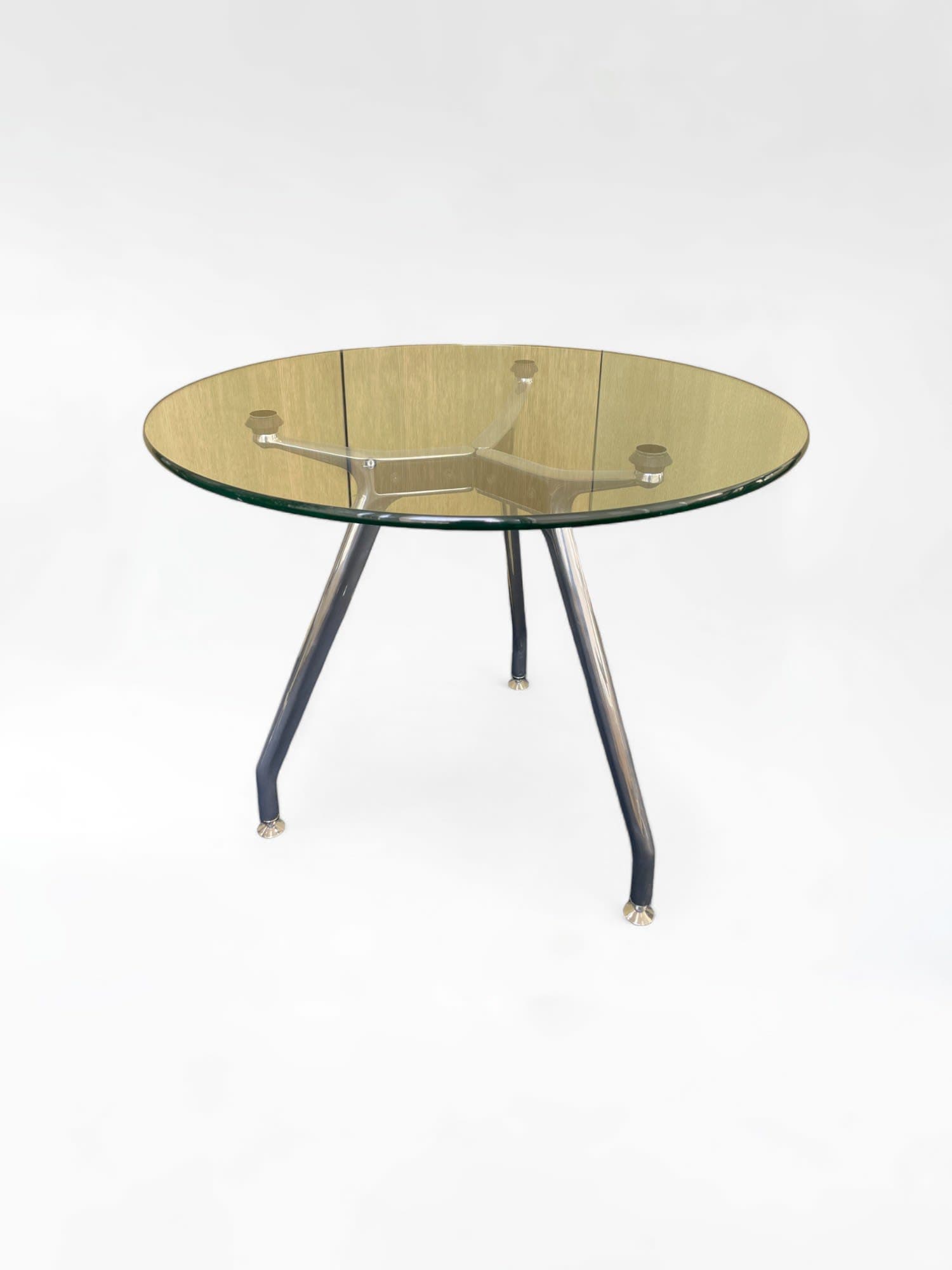 Table ronde en verre avec pieds en métal
