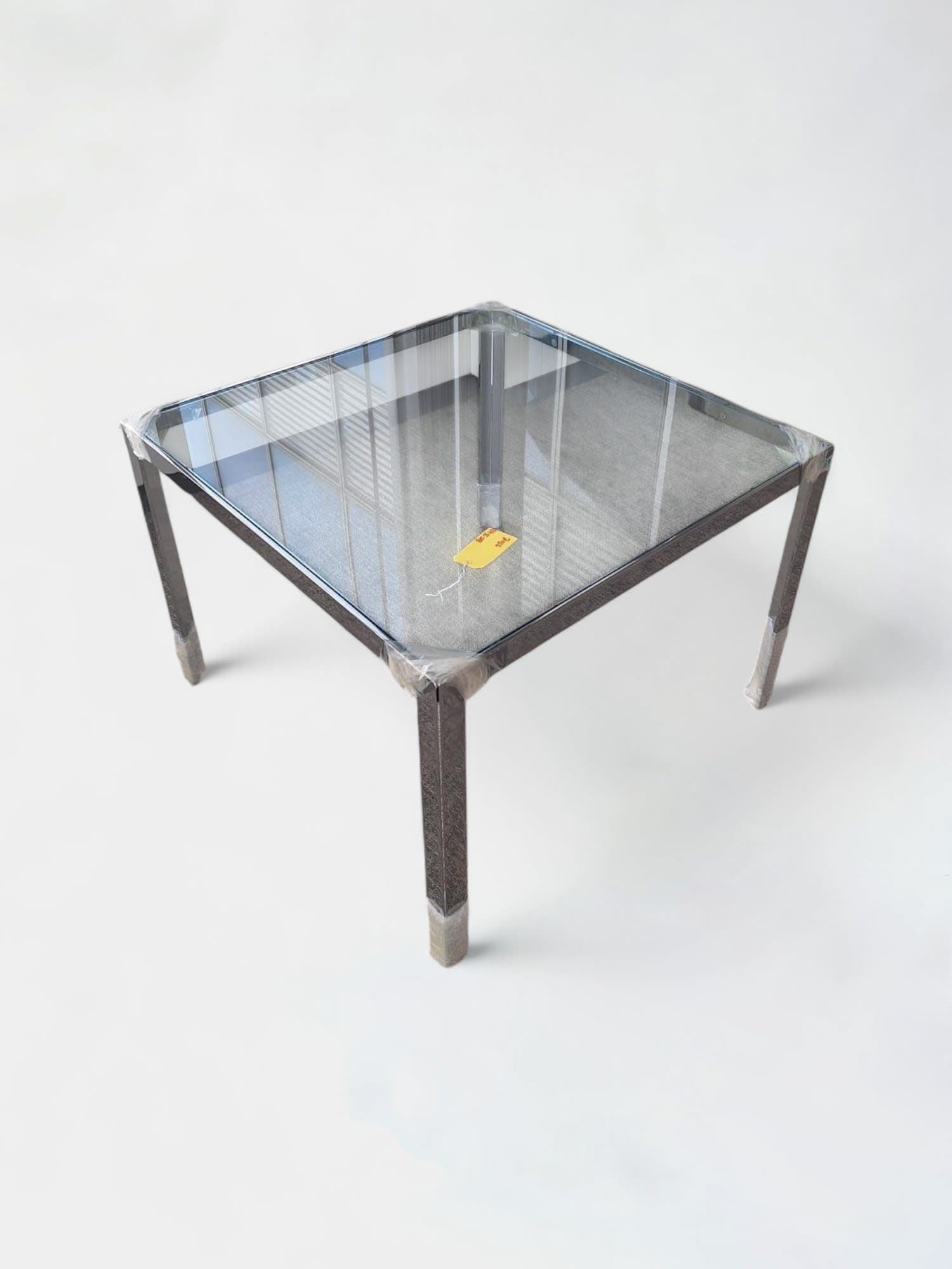 Table carrée en verre Monica Armani avec pieds en métal