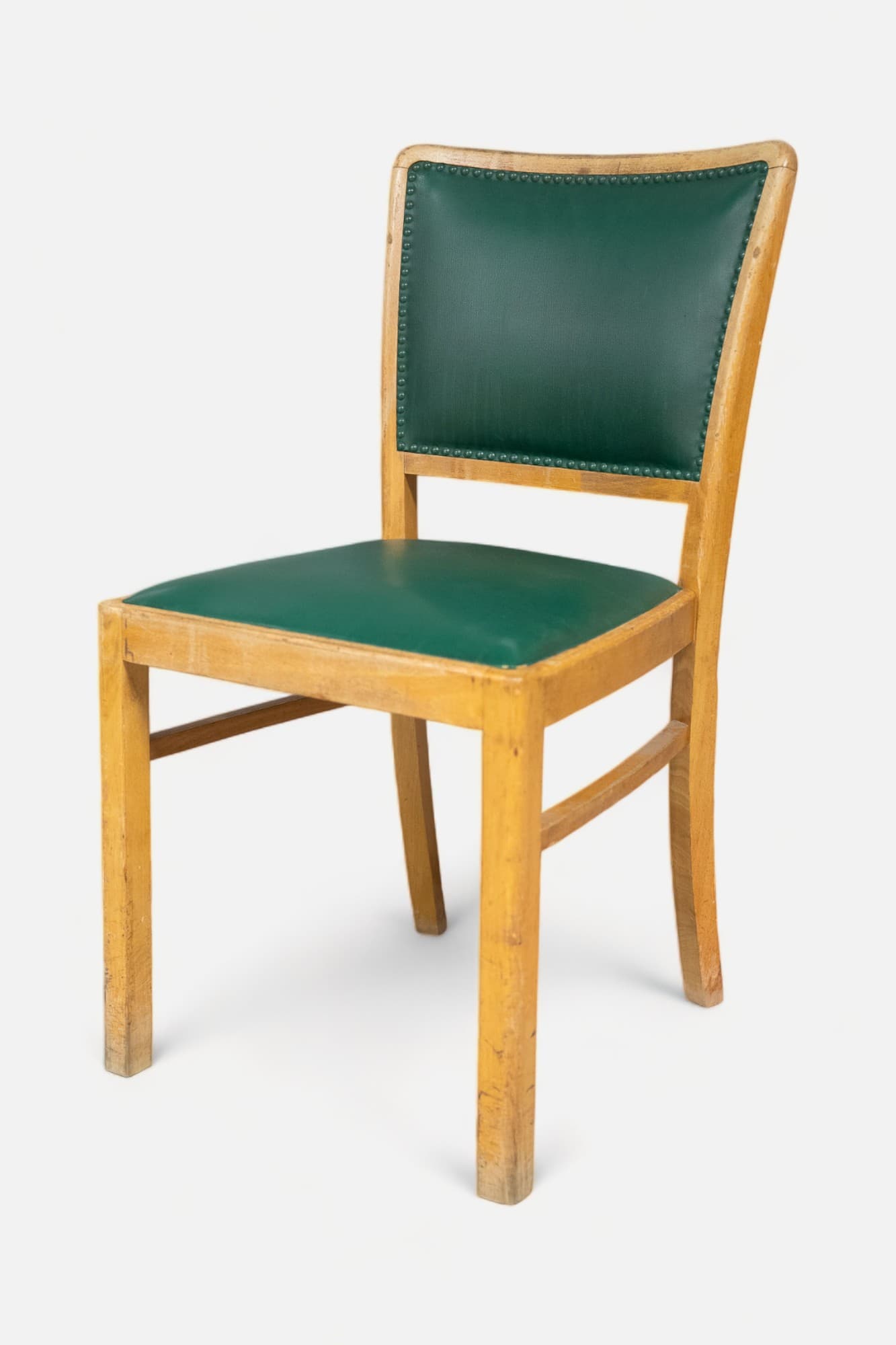 Vintage houten en groene stoel