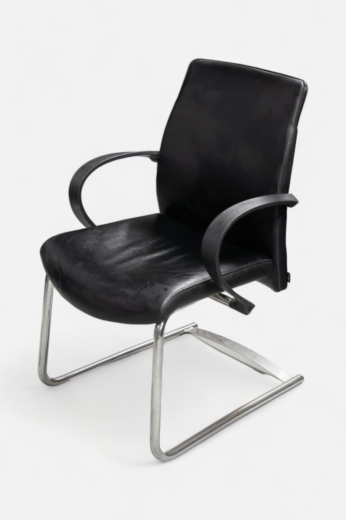 Drabert Black leather chair on steel legs