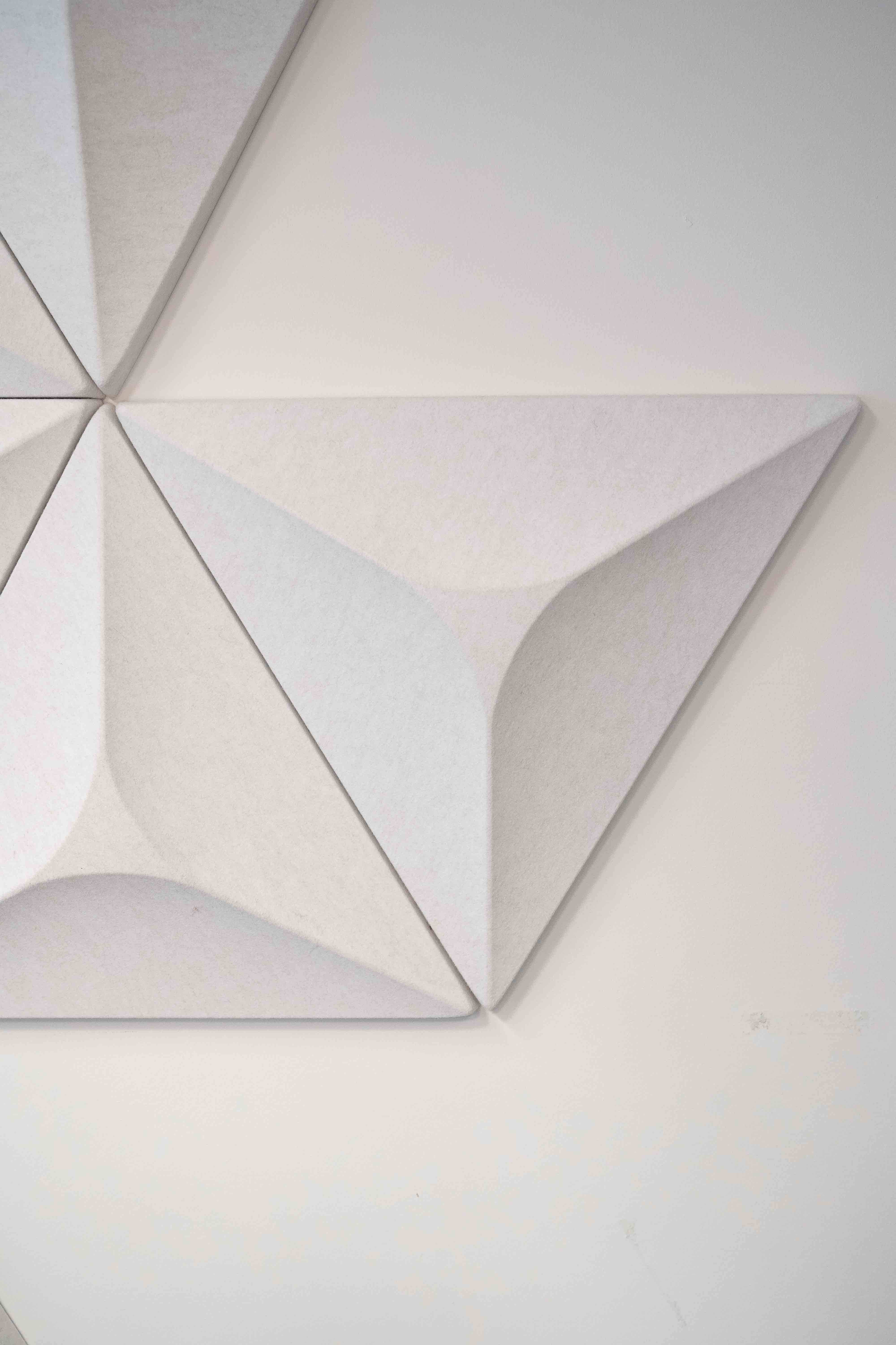 White Acoustic Wall Panels in Geometric Design.
