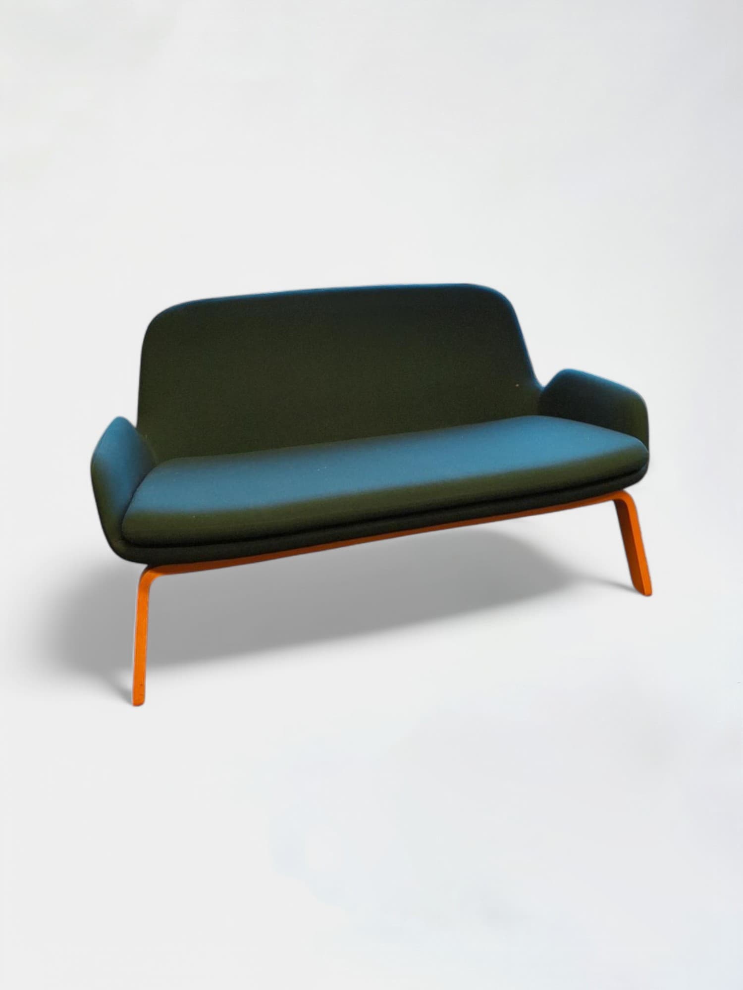 Normann green armchair with Wooden Legs