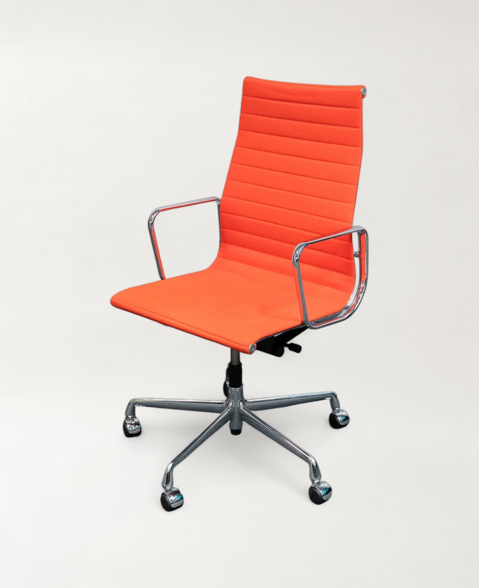 Vitra EA 119 orange chair on castors