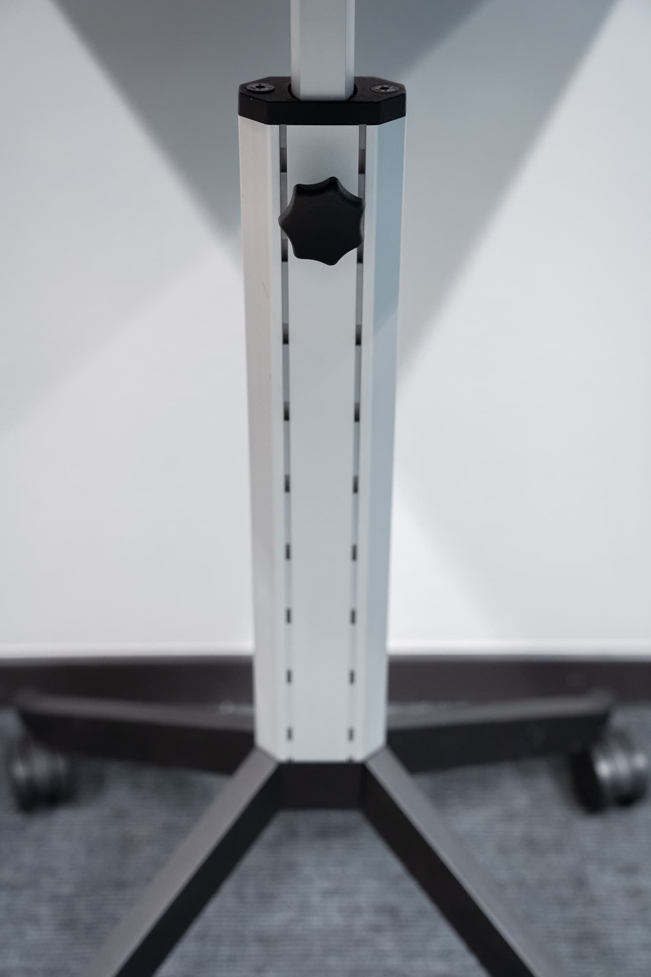 Black mobile 65cm table with height-adjustable on wheels