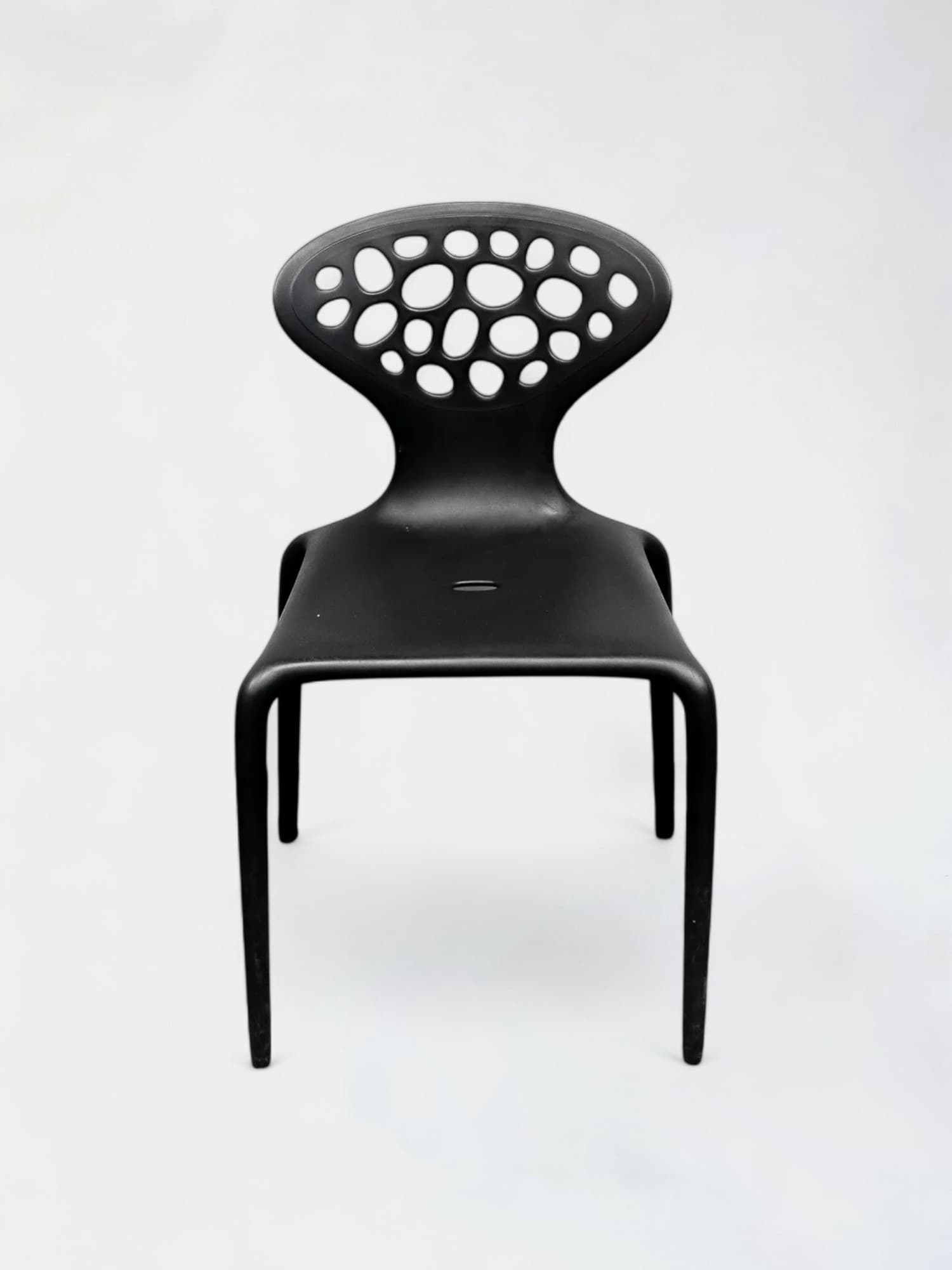 Moroso Supernatural black stackable design chairs