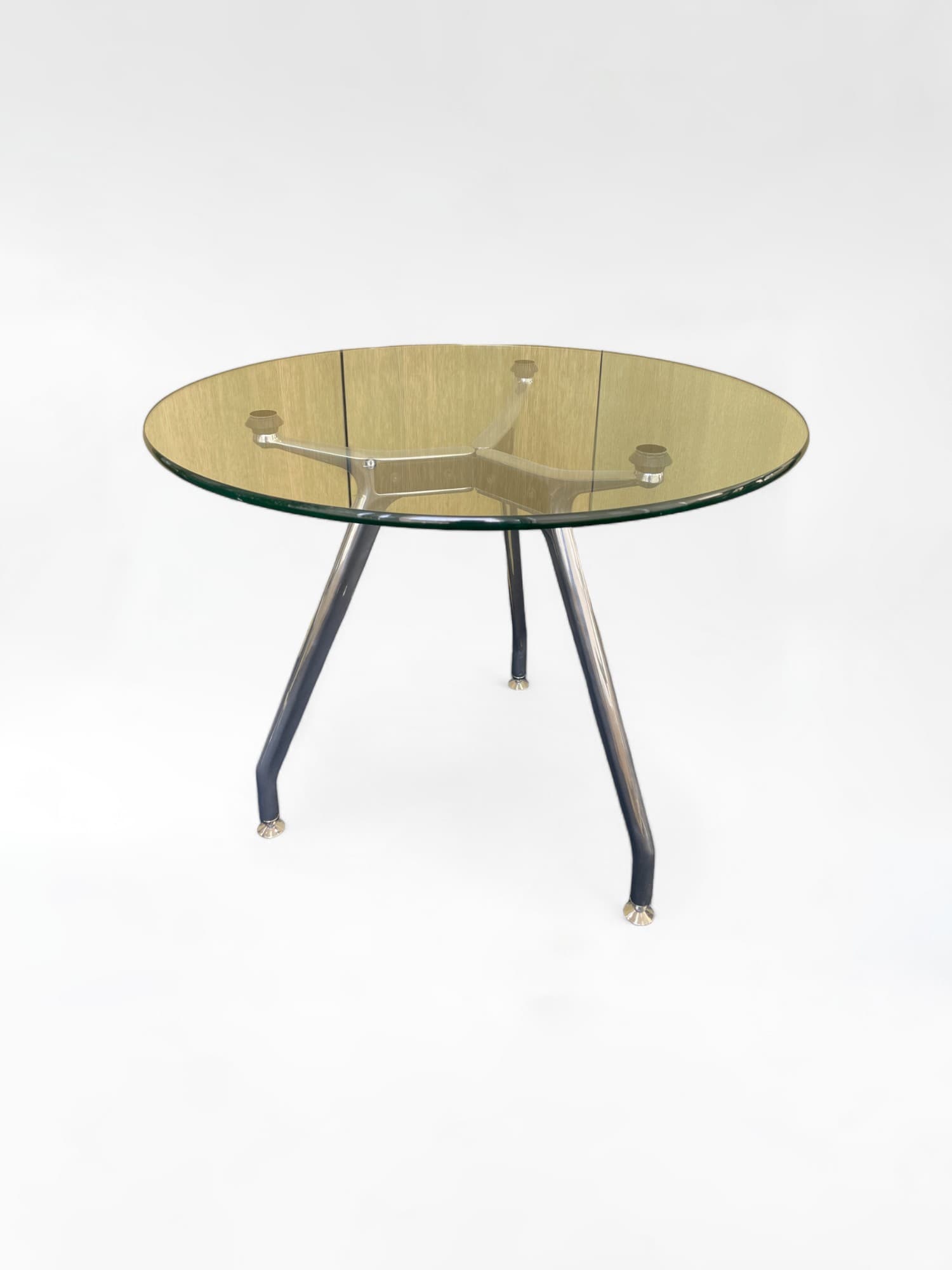 Table ronde en verre avec pieds en métal