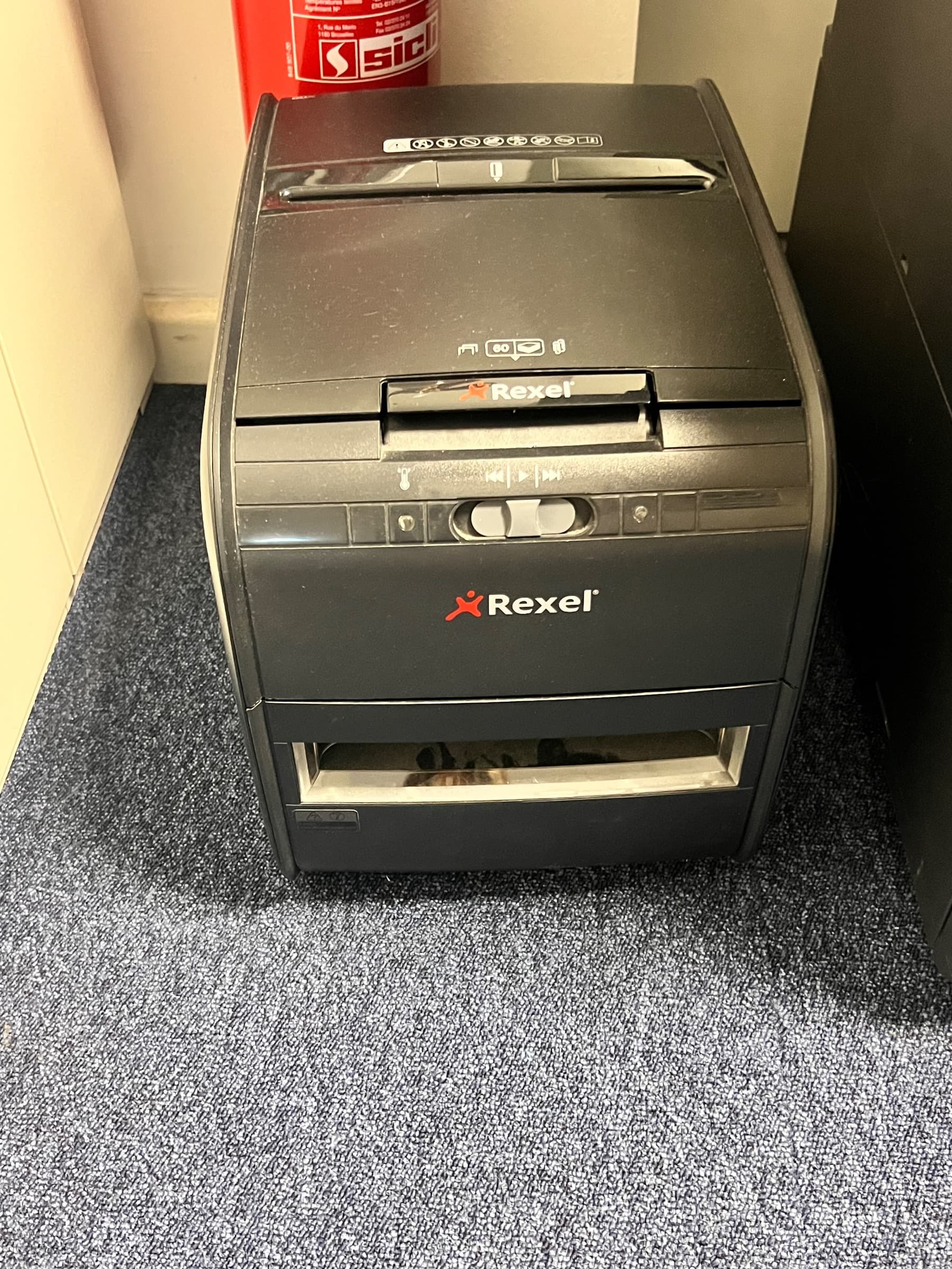 Black plastic paper shredder with safety features