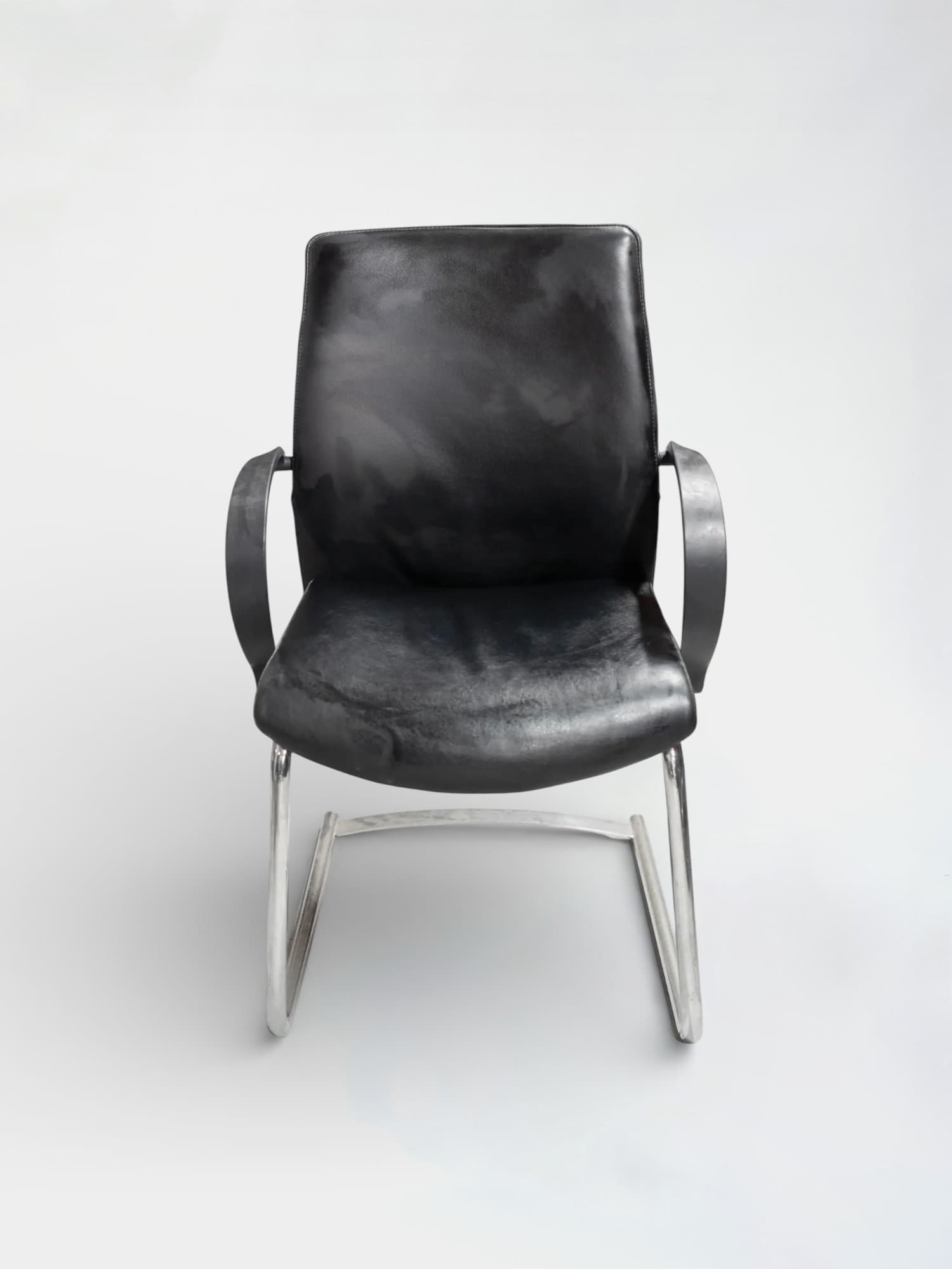 Drabert Black leather chair on steel legs