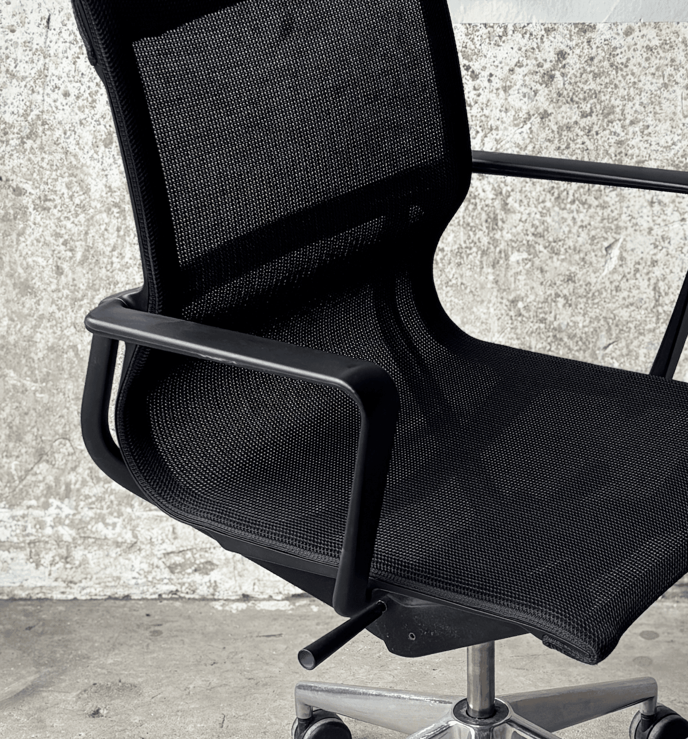 VITRA Physix adjustable black mesh office chair on wheels