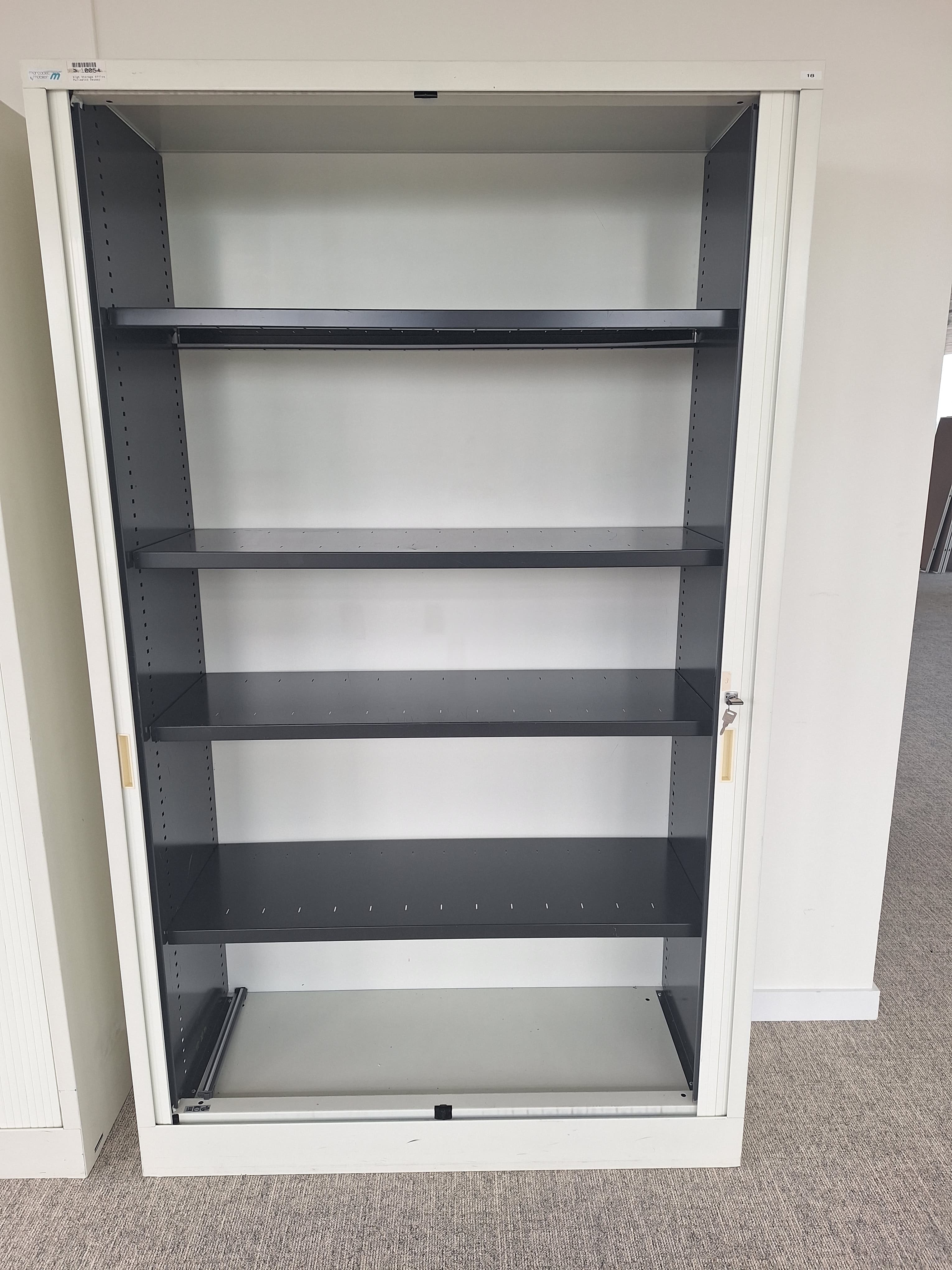 Grey cabinet unit with keyless sliding door