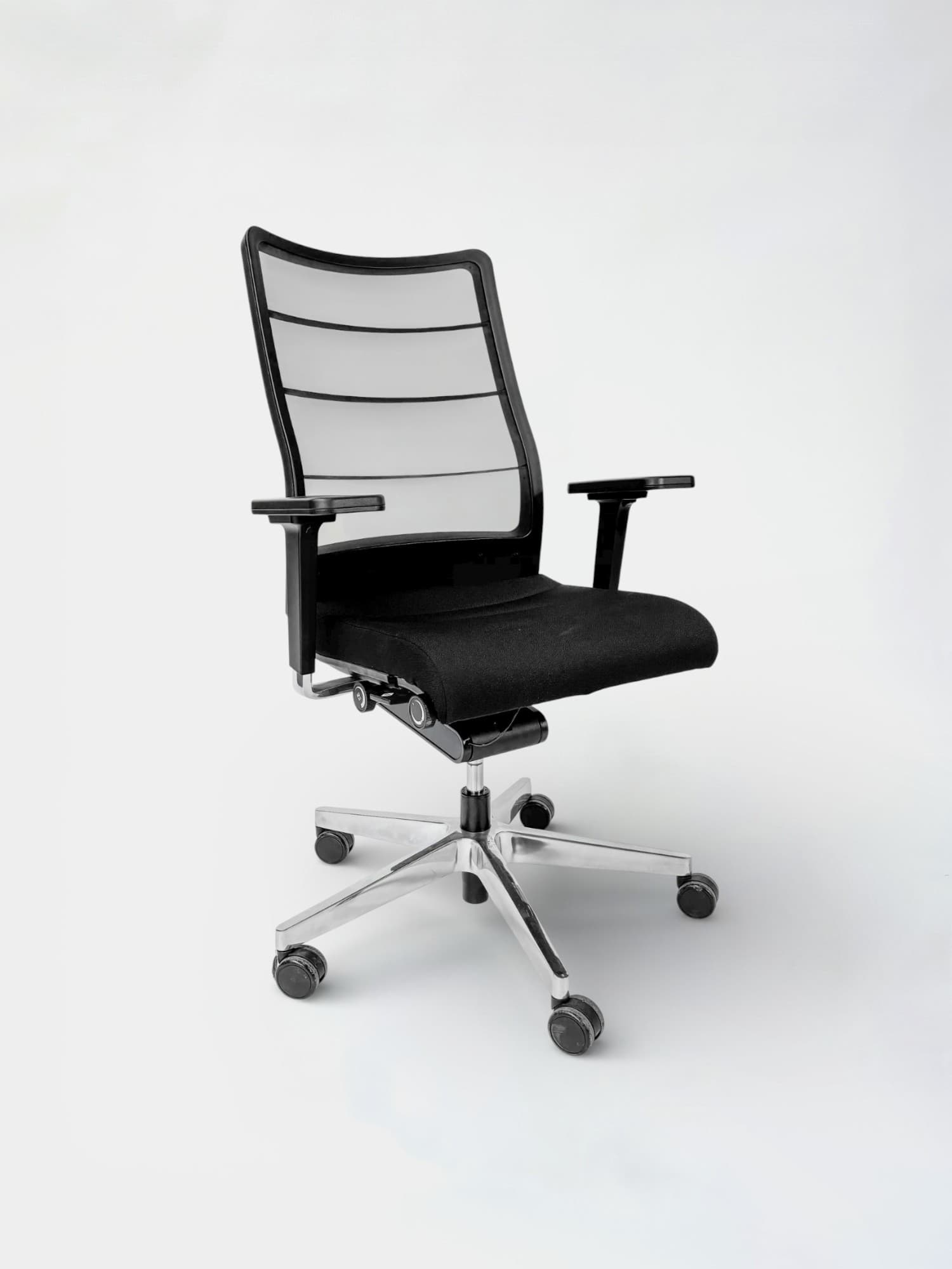 INTERSTUHL Adjustable black office chair with mesh back on wheels